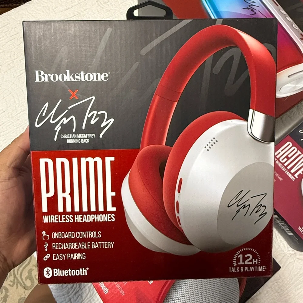 New Brookstone Prime Set of 4! Speaker, headphones, clip on speaker, earbuds!